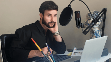 Tarik Mendes amid his recording equipment for his podcast, "Tarik Talk"