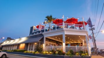 The exterior of Tuckers Tavern at sunset in Beach Haven, Long Beach Island