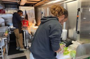 Two students working in the new We Are AC Food Truck in Atlantic City.