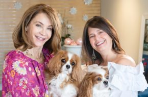 Calia owners Margery St. John and Angela Casiero hold their dogs, who sometimes visit their Bernardsville shop.