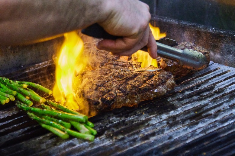 Chef Jeremy Borton grills a 6-ounce filet mignon at Chubby's in Gloucester City.