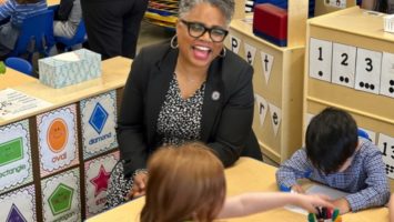 NJ's acting education commissioner Angelica Allen-McMillan interacts with young students