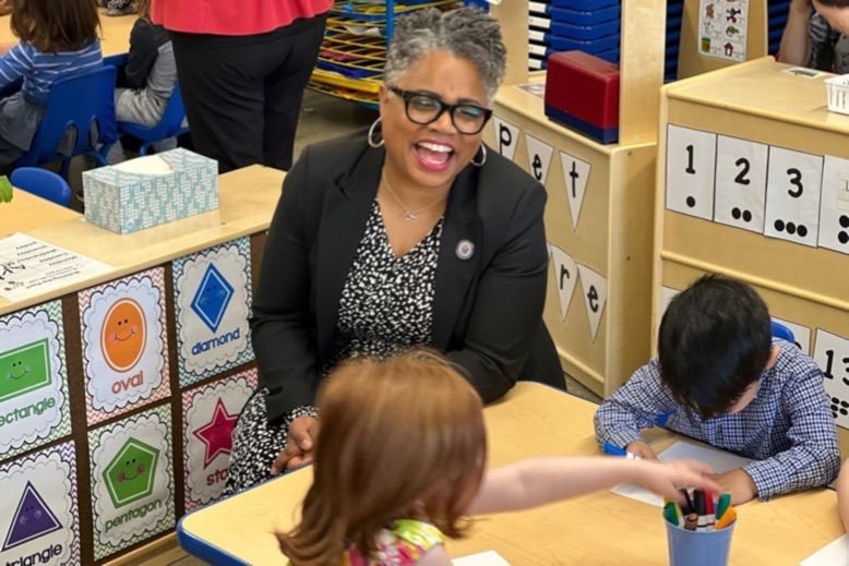 NJ's acting education commissioner Angelica Allen-McMillan interacts with young students