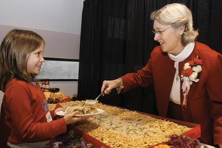 Dorcas Reilly serving her green-bean casserole in 2002, when the recipe was enshrined at the National Inventors Hall of Fame