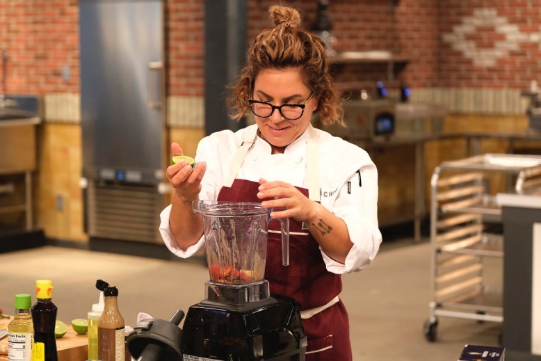Leia Gaccione prepares to whip up ingredients in a blender on the "Top Chef" set.