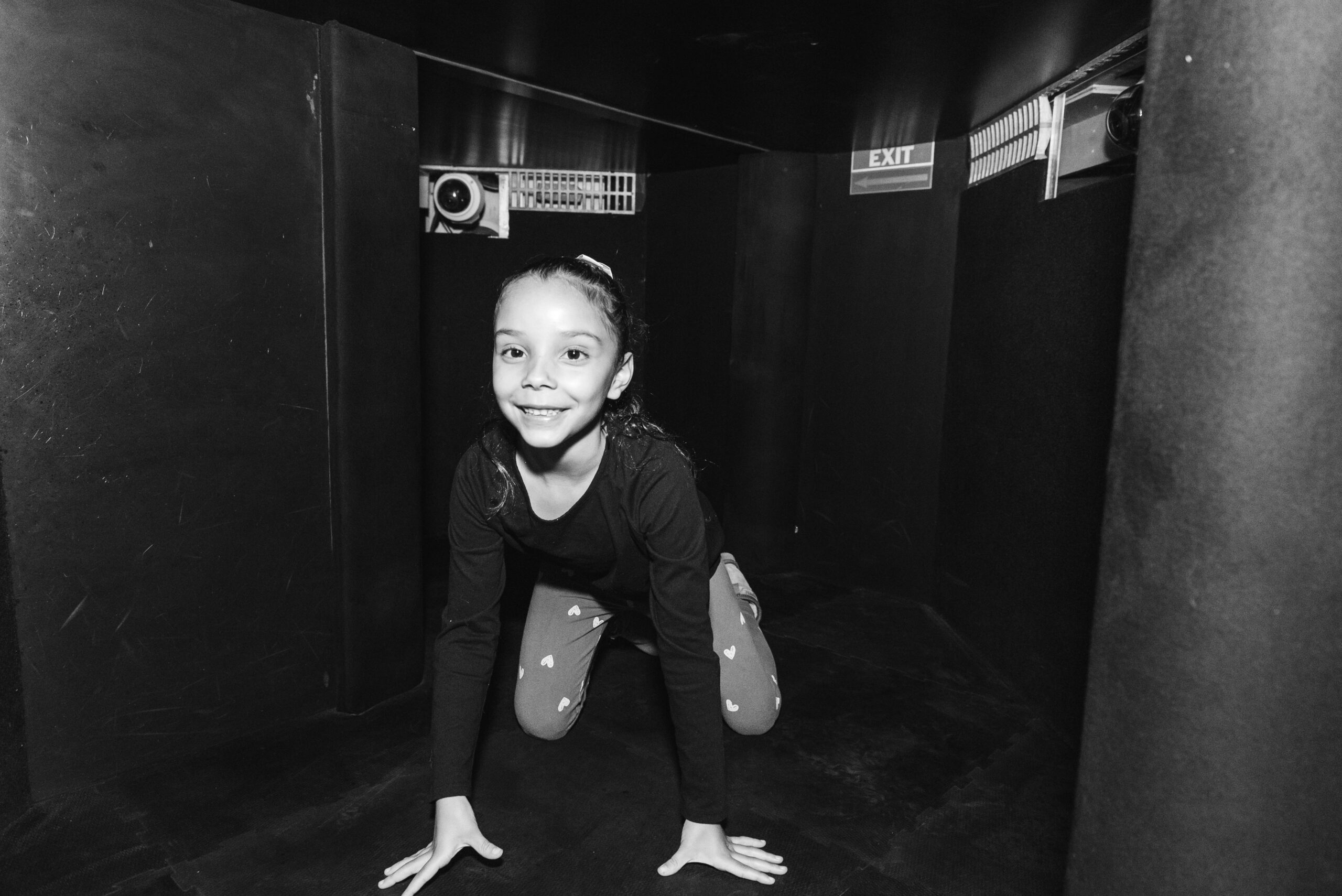 Young girl exploring Liberty Science Center's Touch Tunnel