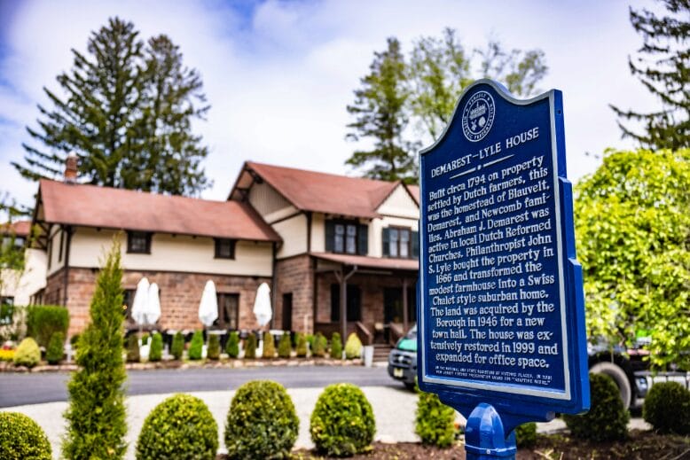 A historical marker in front of the Spring House in Tenafly indicates that it is the oldest house in town