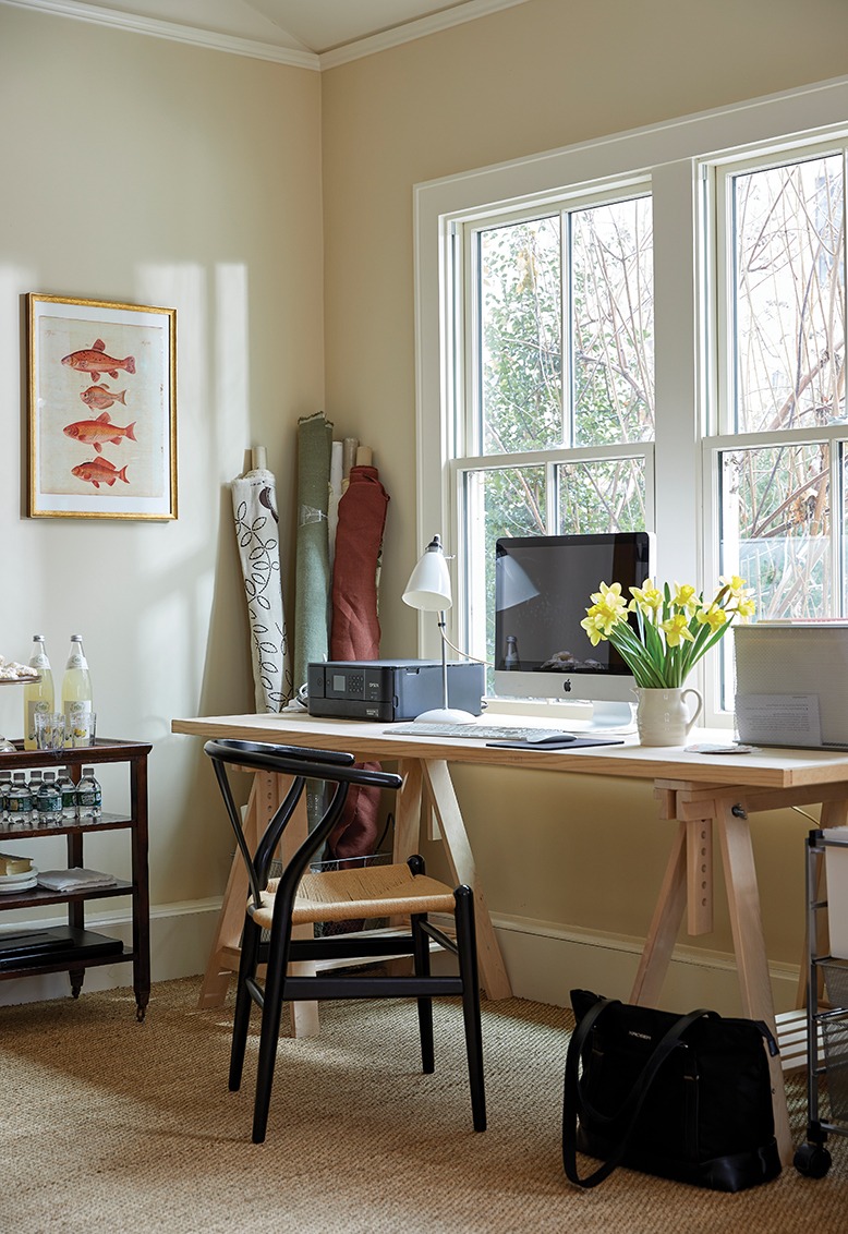 Ross's bookkeeping desk below a window basks in plenty of light.