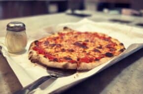 A thin-crust cheese pizza at Mercato Tomato Pie in Newark