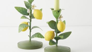Two candle holders modeled after lemon tree branches.