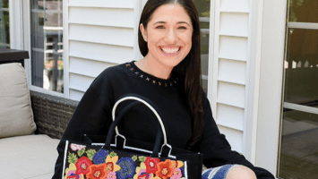 Embroidery Babes founder Michelle Fleischer with one of her custom totes