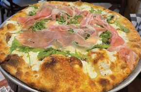 Pizza topped with mozzarella, ricotta, Pecorino Romano, extra virgin olive oil and prosciutto at Via Sposito in Old Bridge.