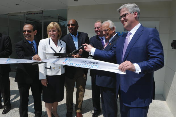 Congressman Bill Pascrell cuts the ribbon at the new $17 million NBC Universal Technology Center.