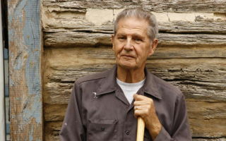 Harry Rink maintains his 377-year-old cabin the old fashioned way.