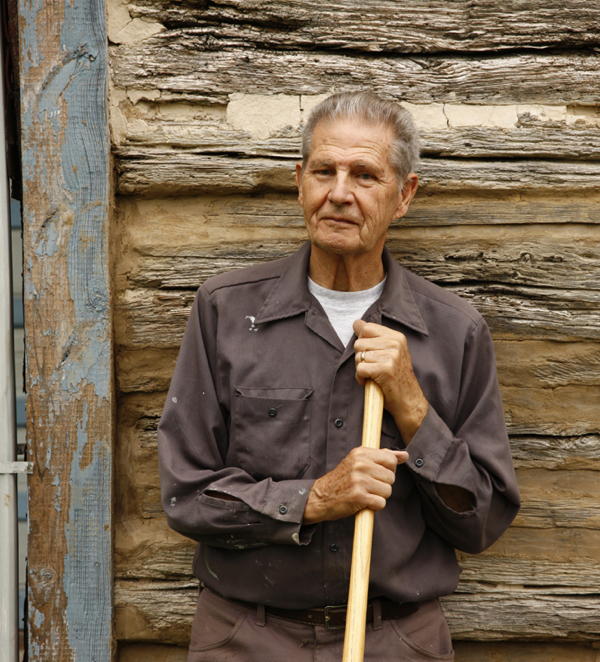 Harry Rink maintains his 377-year-old cabin the old fashioned way.