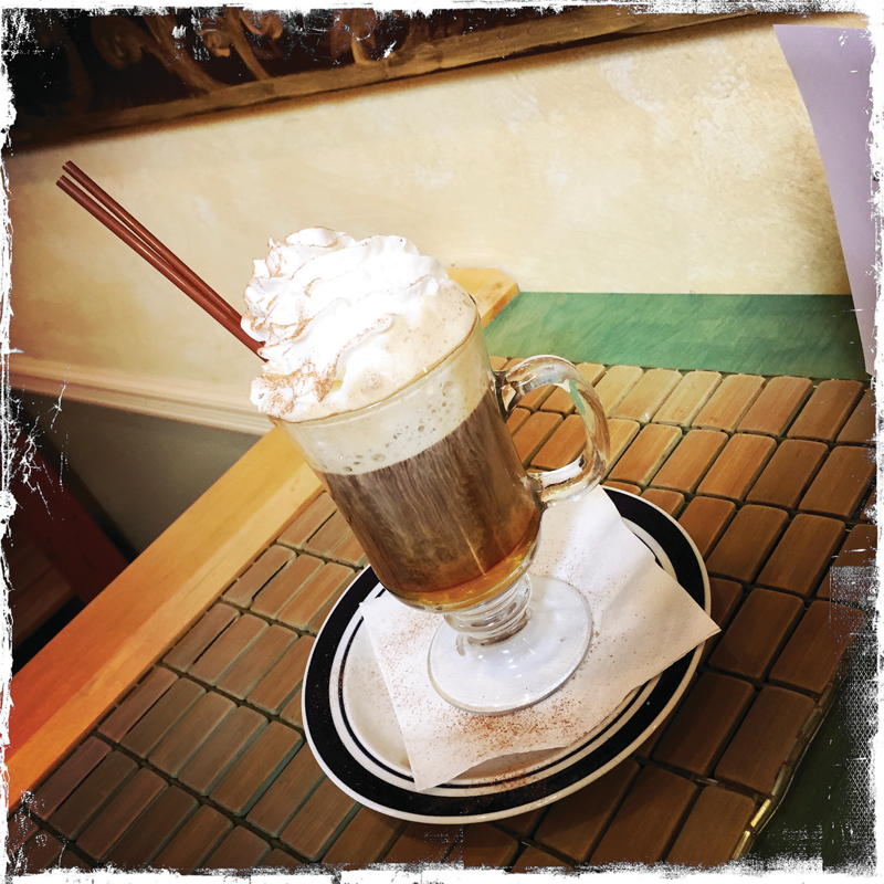 The Honey Espresso, a double espresso lavished with honey, whipped cream, cinnamon and nutmeg.