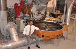 Surgeon Harold E. Chung-Loy, known as Reggie, hangs out with the big roaster at Reggie's Roast headquarters.