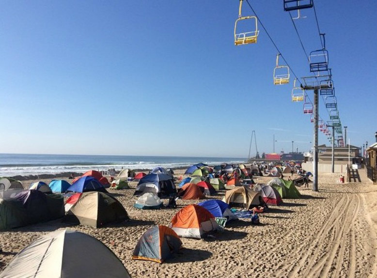 Tents were lined up on the beach from the waves to the boardwalk. Photo courtesy of Instagram via @mattbokey