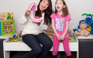 Rosalie P. Nguyen Edgewatwer, NJ with 5 year old patient Meghan Manning. Top Dentists