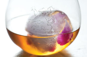 Tamasaki single-malt Japanese whiskey, served over an organic orchid encased in a sphere of ice at Le Malt.