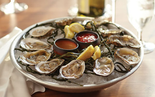 Oyster platter with white wine.