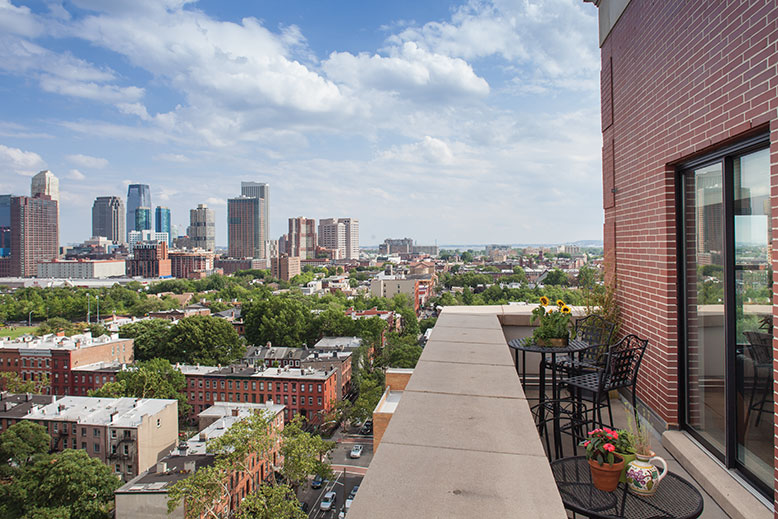 The view from Lauren Shub and Bob Eidus's penthouse apartment includes five bridges, the Statue of Liberty and downtown Jersey City.