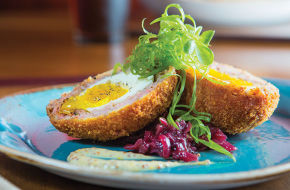 The Scotch egg, encased in ground pork and panko bread crumbs.