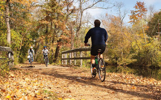 Bicyclists enjoy the picturesque (and flat) D&R Canal State Park towpath.