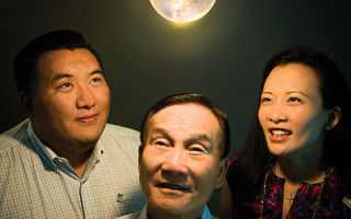 Andrew Choi, center, with son Eric, a product manager and daughter Cathy, who serves as president of the company Andrew founded after arriving in America in 1968.