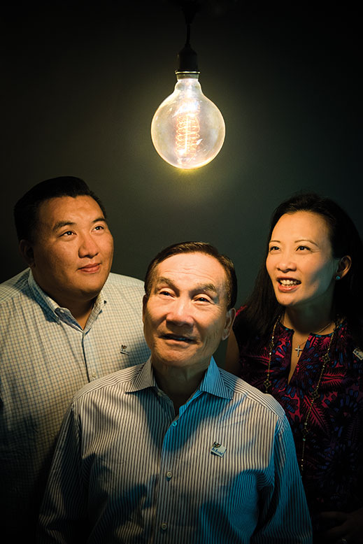Andrew Choi, center, with son Eric, a product manager and daughter Cathy, who serves as president of the company Andrew founded after arriving in America in 1968.