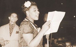 Ella Fitzgerald at the Asbury Park Casino in 1938 with bandleader Chick Webb.