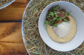 The Egg in a Nest combines a slow-cooked Double Brook Farm egg with chedder polenta, pea tendrils and mushrooms in a wreath of hay from the farm.