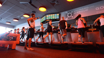 Orangetheory Fitness members on treadmills