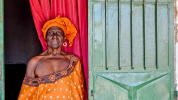 The exhibit’s central image is this striking portrait of a village matriarch by photographer Beth Eanelli, a Ridgewood resident.