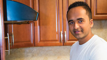 At his parents' home in Edison, 25-year-old entreprenur Akhil Shah demonstrates how easy it is to prepare one of his Chutney Chefs authentic Indian meal kits.