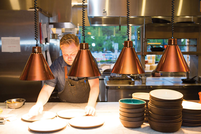 Common Lot: Co-owner executive chef Ehren Ryan at the pass.