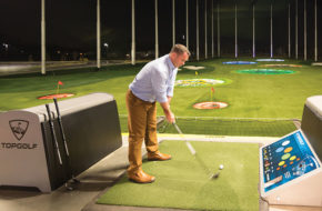 Players at Topgolf in Edison take aim at driving-range targets using microchipped golf balls that track the distance and accuracy of each shot.