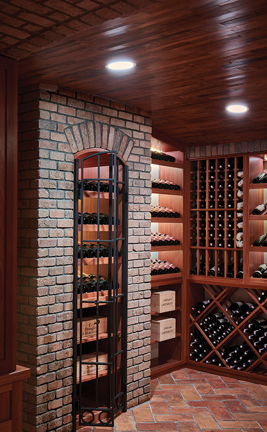 The 600-square-foot cellar features a mahogany vaulted ceiling crafted to mimic wine barrels.