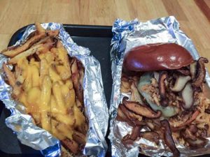 Cheese fries with a Swiss mushroom shallot burger at Loaded Burgers & BBQ in Garwood, New Jersey