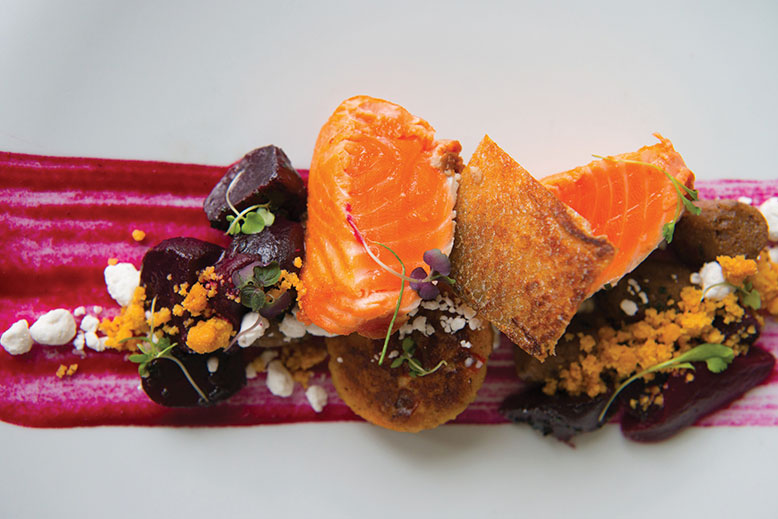 Pan-roasted Ora King salmon with beets, parsnip and bacon dust.