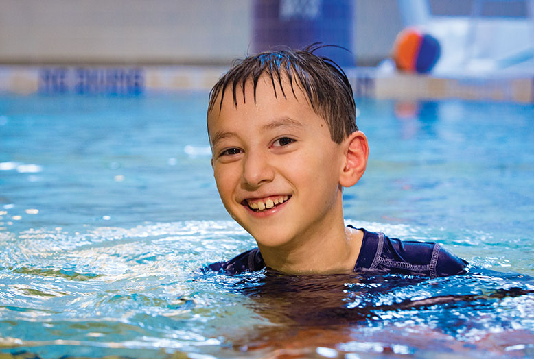 Christian Ford took his first swim class at Children's Specialized Hospital when he was four. Before the class, the North Brunswick boy was uncomfortable with water touching his hands or face.