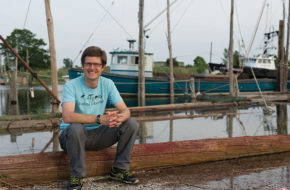 Rutgers marine biologist Malin Pinsky­ surveys the fishing fleet at Belford Seafood Co-op. Pinsky and a team of fellow scientists are studying the effects of marine migrations on the commercial and recreational fishing industries.