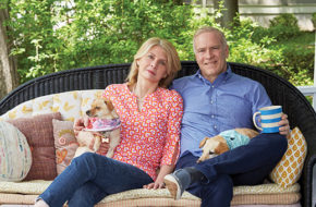 Surrounded by reclaimed outdoor decor, Susan and Bob Bush chill out on their whimsical front porch.
