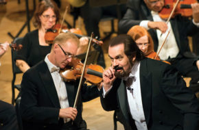 George Marriner Maull, creative director of the Discovery Orchestra, instructs the audience to listen closely during the 30th Anniversary Concert at Drew University in April.