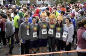 Runners get ready for the 2016 Ashenfelter 8K Classic in Glen Ridge on Thanksgiving morning.