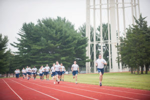 Members of the Air National Guard on a 1.5-mile run to help determine their overall fitness.