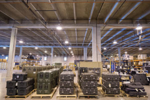 A vast warehouse filled with medical supplies that can be deployed for disaster relief.