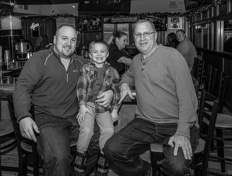 Pete & Elda's owner George Andretta (right) with son Chris and grandson Christopher.