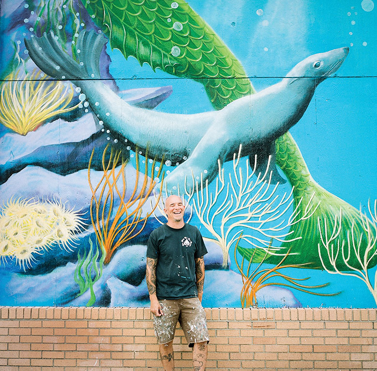 Asbury Park artist Porkchop gets a kick out of his mural “Ruthie & Andre.”