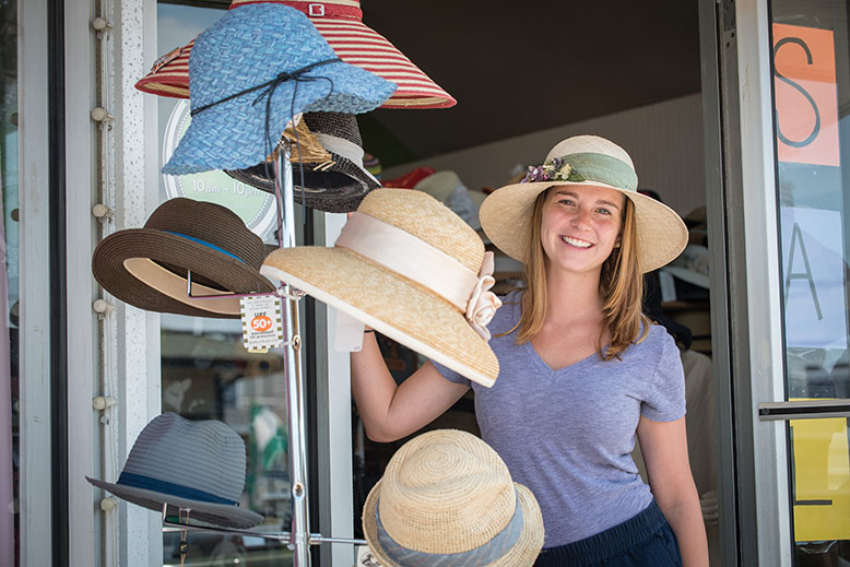 Employee Sarah Moyer models the goods at the Mod Hatter in Beach Haven.